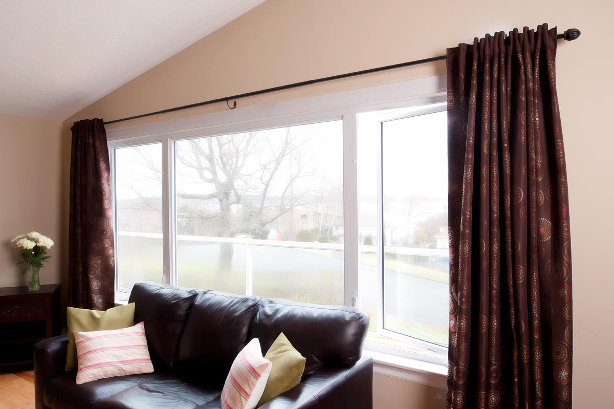 Living room casement windows with a large picture window