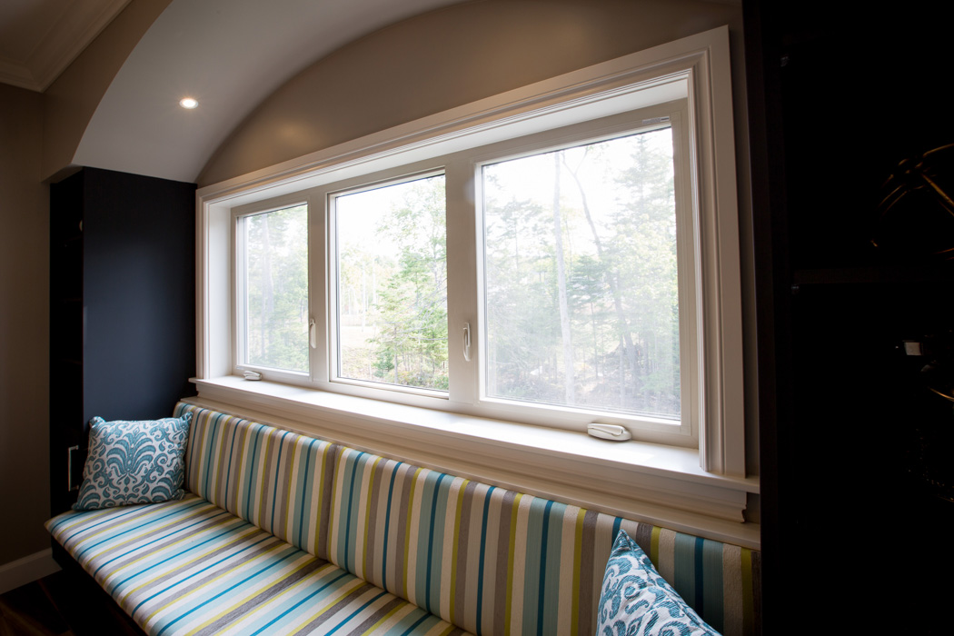 Casement windows over a couch