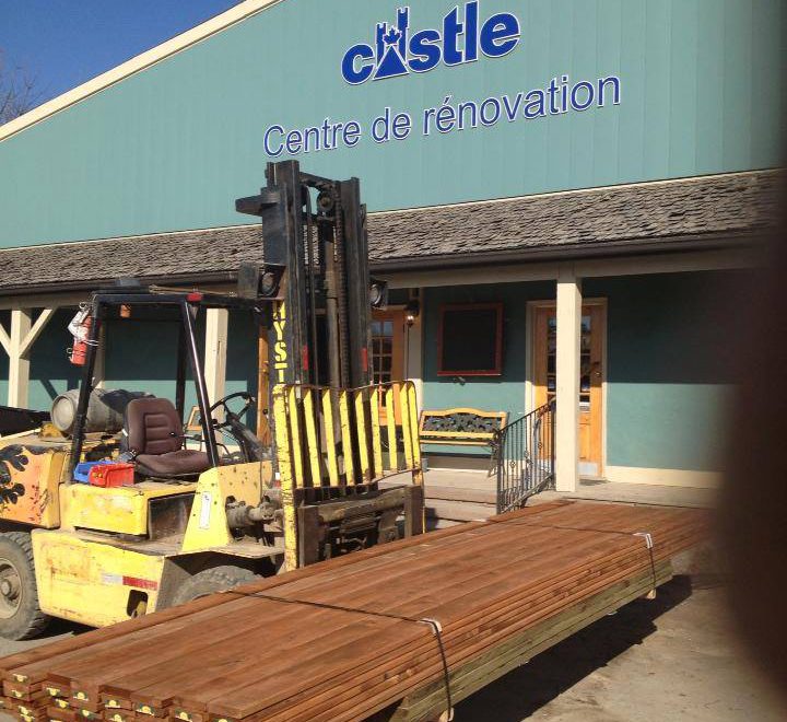 Hudson Hardware & Supplies Ltd. Front of building with forklift and wood